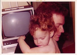 Joanne as a child hugs her dad Bruce