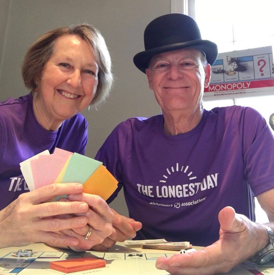 Volunteer co-chairs Nancy and Bart play games for the Longest Day