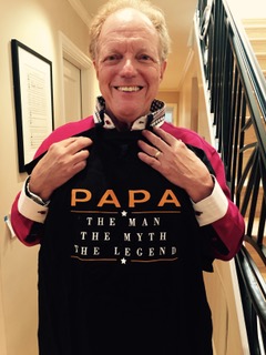 Bruce, living with Alzheimer's, poses with a gift