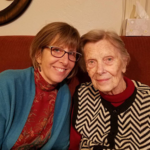 Volunteer Sharon poses with her mom living with Alzheimer's