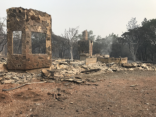 Smoking remains of Kirsten Guanella's home after the Tubbs fire