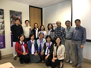 Alex poses with the first group of Mandarin speaking community educators