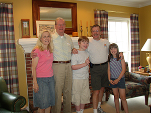 Art, who had Alzheimer's, with his son and grandchildren