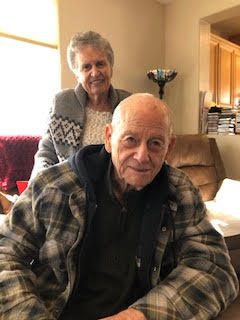 Andy and Phyllis pose in their memory care facility and both live with dementia