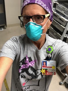 ER Nurse Margo wears Alzheimer's flower pins she sells as a fundraiser