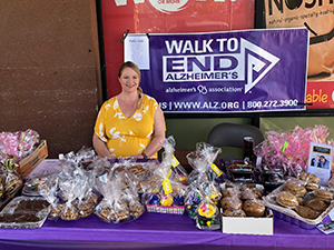 Summerfield staff have a bake-sale for Walk to End Alzheimer's fundraiser