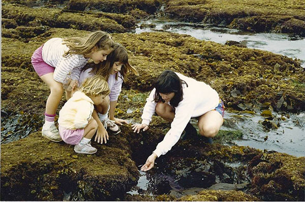 Peggy with her daughters at the tide pools before her dementia diagnosis