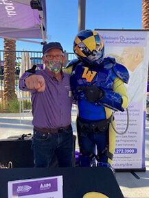 Chuck with the Las Vegas mascot at the Walk to End Alzheimer's