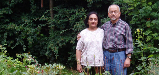 Mukund, Alzheimer's Association volunteer, and wife in garden